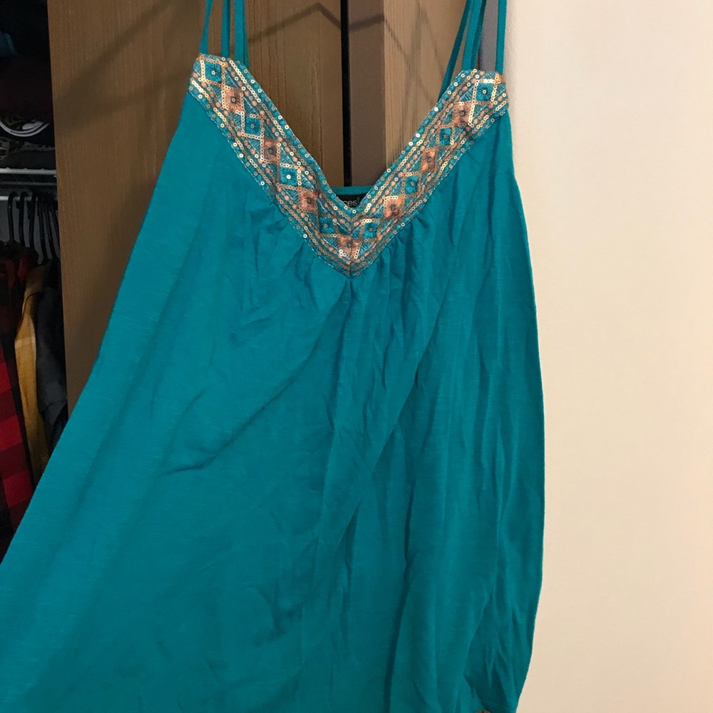 Maurice’s tank top